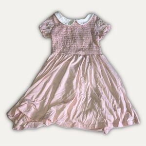 Eleven’s Adorable Pink Babydoll Dress